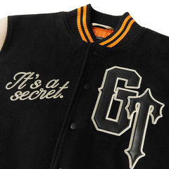 geedup_x_trapstar_letterman_jacket_black_cream_orange_2025_9