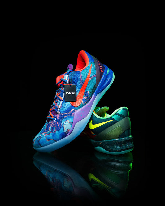 Nike Kobe 8 Protro What The 2025 multicolour pair on a black background with PUSHAS tag