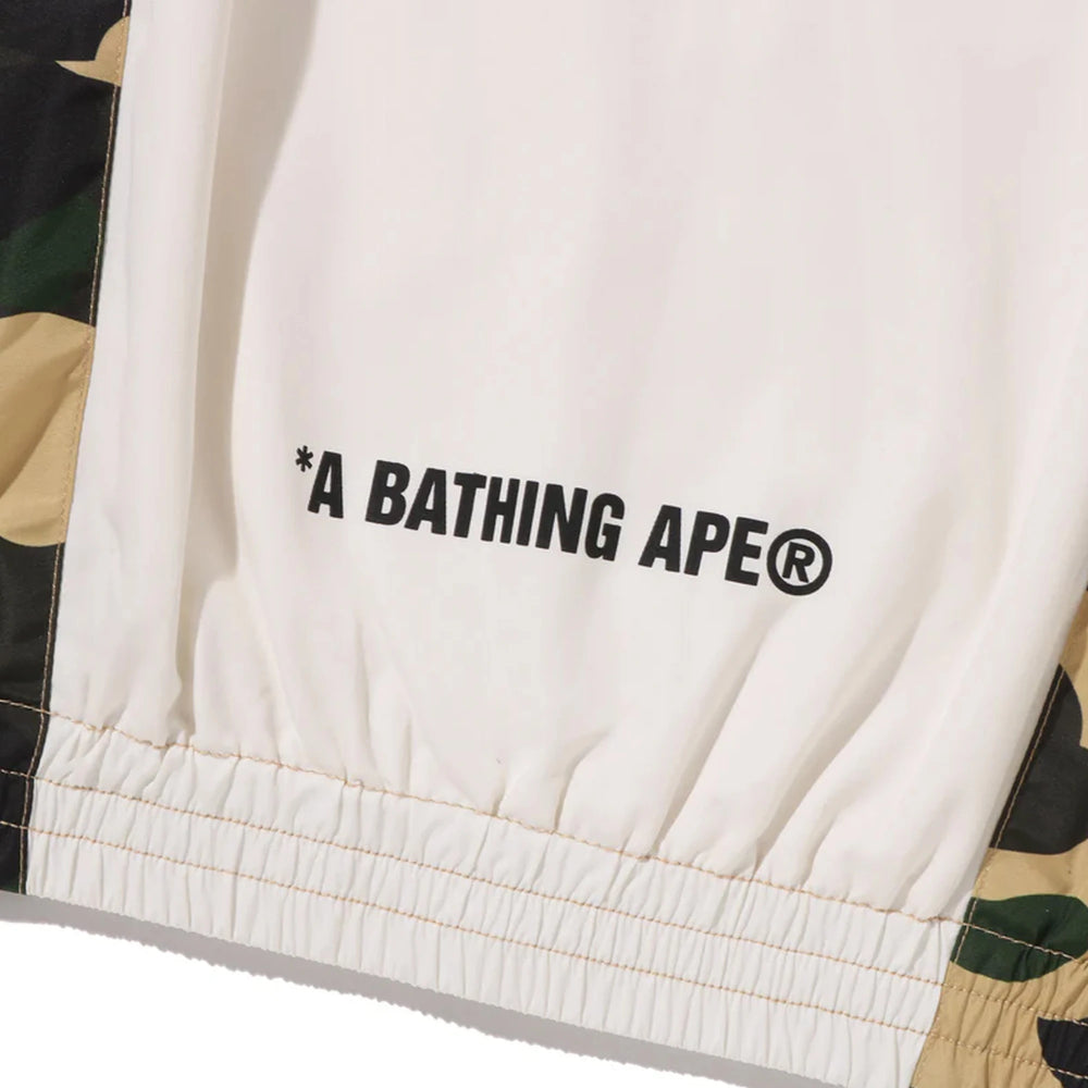bape_1st_camo_stand_collar_track_jacket_yellow_3