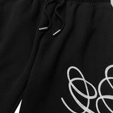 geedup_cursive_logo_trackpant_black_white_2026_3