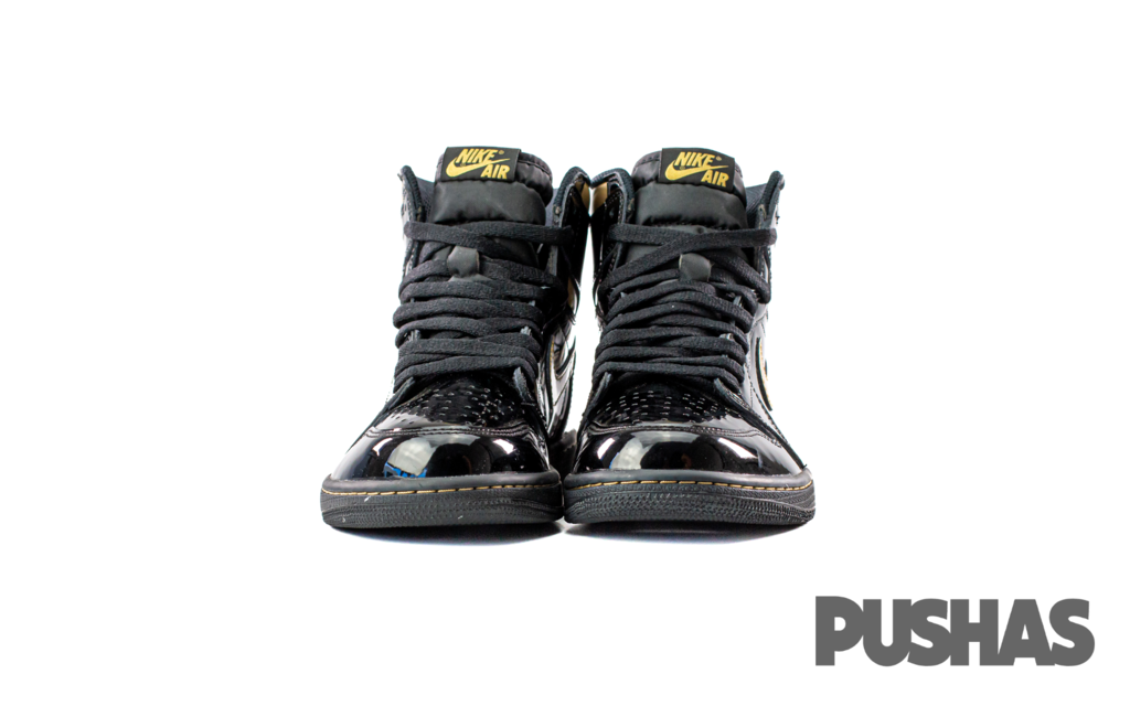 Black and online gold jordans 1s